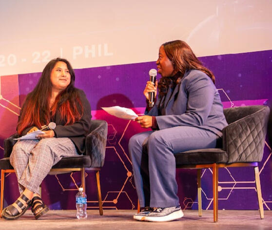Shana Feggins moderating a panel